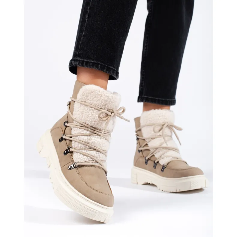 Beige women's snow boots with sheepskin