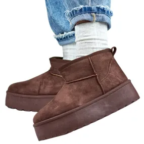 Brown snow boots with a thick sole