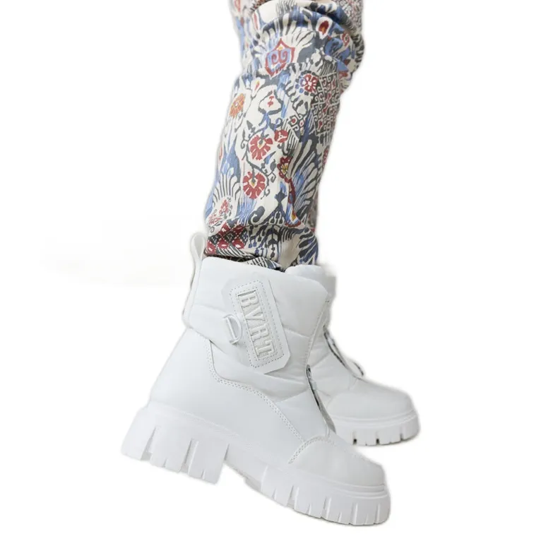 White insulated snow boots with Eulalia inscriptions