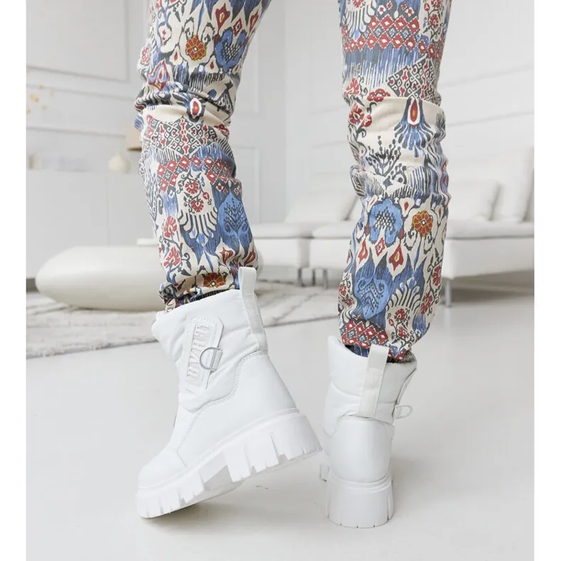 White insulated snow boots with Eulalia inscriptions